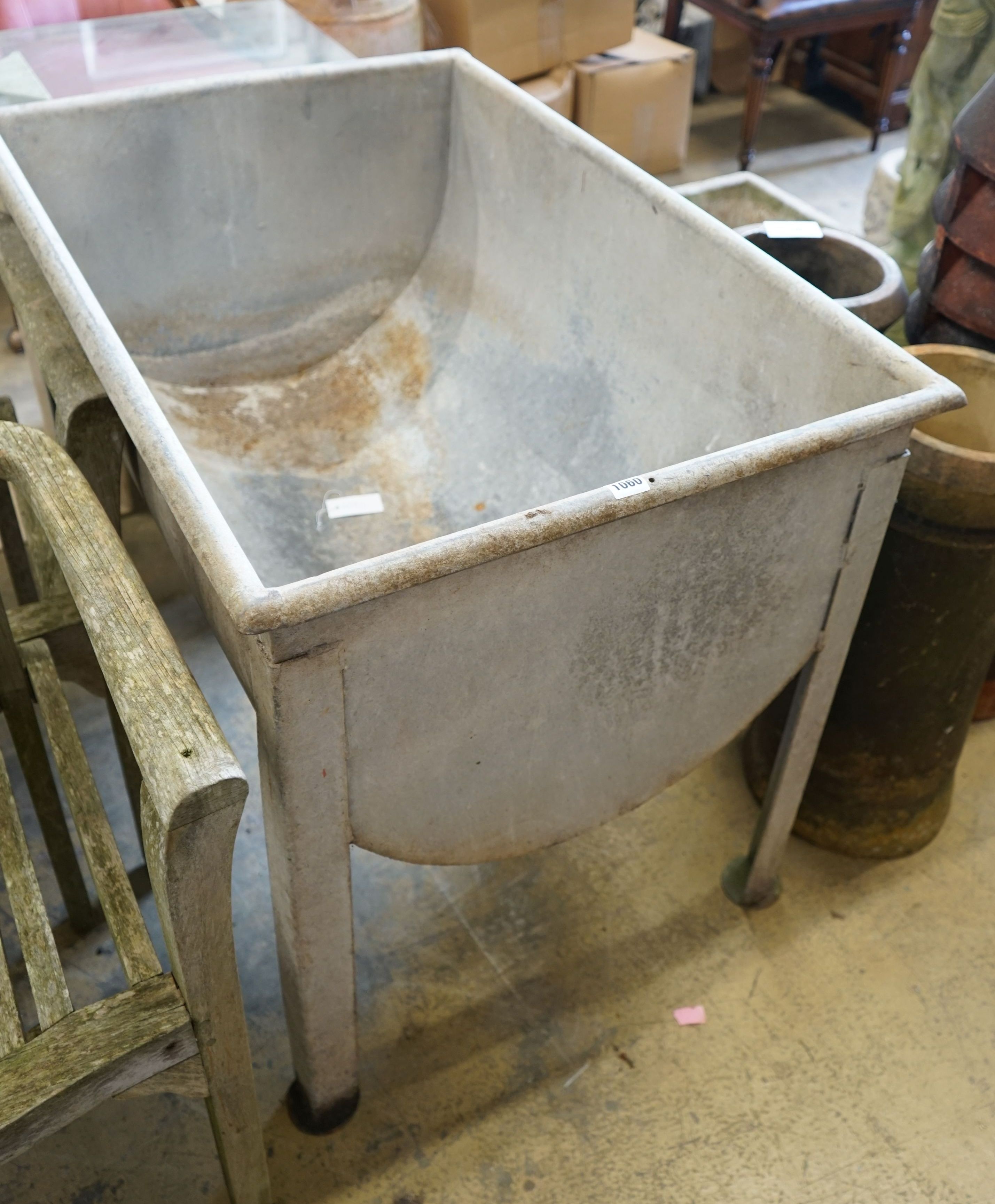 A rectangular galvanised metal water trough, length 97cm, depth 66cm, height 77cm